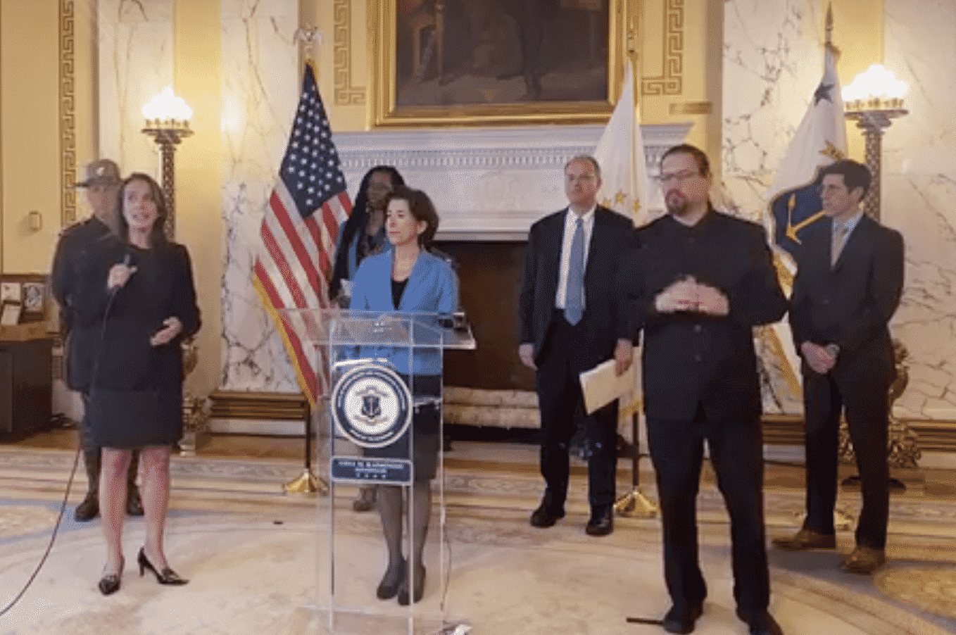 Gov. Gina Raimondo held a press conference March 26, announcing travel from New York state, a disease hotspot, will be screened by RI State Police.
