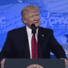 [CREDIT: White House] President Donald Trump delivers remarks at the Conservative Political Action Conference (CPAC). Trump has been delaying using the DPA to provide supplies in the COVID-19 fight.