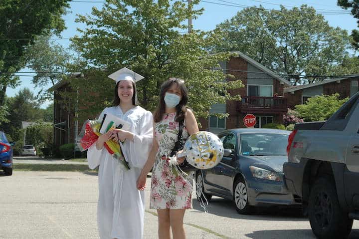 [CREDIT: Rob Borkowski] Pilgrim High 2020 grad Michelle Bergeron and her Mom Julianne on their way to her commencement during the 2020 Pilgrim High graduation.