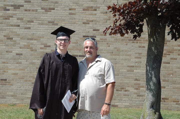 [CREDIT: Rob Borkowski] Pilgrim High 2020 grad Skylar Carter and his dad, Thomas, during the 2020 Pilgrim High graduation.