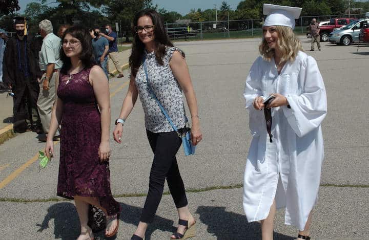 [CREDIT: Rob Borkowski] At right, Kailey Murphy on her way to her graduation June 4, 2020 with, from right, Taylor Diefenbach and Kailey's mom, Nicole.