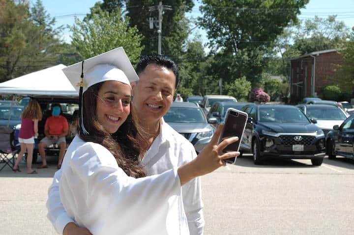 [CREDIT: Rob Borkowski] Pilgrim High 2020 grad Diana Cepeda takes a selfie with her dad, Dino, after receiving her diploma June 4, 2020.