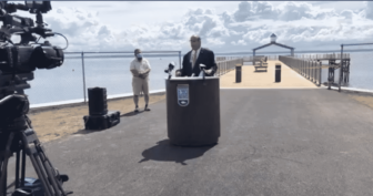 [CREDIT: Mayor Solomon's office] Mayor J. Solomon addressed officials gathered for the ribbon cutting declaring the newly finished Rocky Point Park Fishing Pier Open.