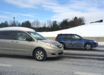 [CREDIT: Rob Borkowski] A car with the snow and ice from a recent snowstorm still riding with the driver at 55 mph. There is an $85 fine in RI for driving your car in this condition.