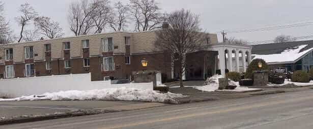 [CREDIT: Rob Borkowski] A 3 a.m. fire at Chateaux Apartments Feb. 13,2021 left residents displaced and in need of money donations, said Mayor Frank Picozzi, who has set up a collection bucket in his front yard. 