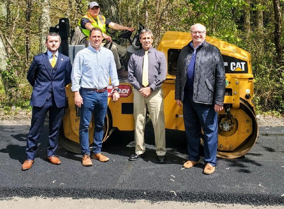 [CREDIT: RI Infrastructure Bank] From left: Councilman Anthony Sinapi, DPW Director Eric Earls, Mayor Frank Picozzi, and RI Infrastructure Bank CEO Jeffrey Diehl toured work on Hardig Road Thursday.