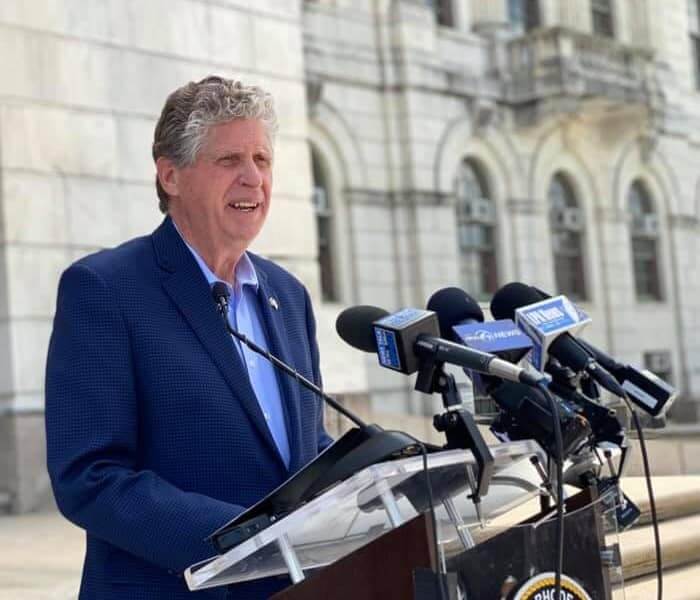 [CREDIT: Gov. Dan McKee Facebook page] RI Gov. Dan McKee announces new mask-wearing guidance at the State House on May 14, 2021, setting May 21 for COVID Restrictions Lifted.