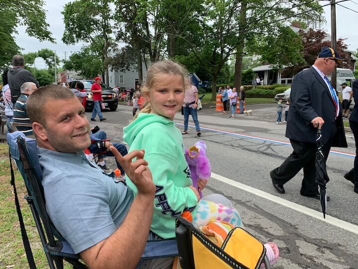 [CREDIT: Rob Borkowski] Kevin McCarthy and his daughter, Asliyna Sollitto,6, watch the 2021 Gaspee Day Parade Saturday, June 12.