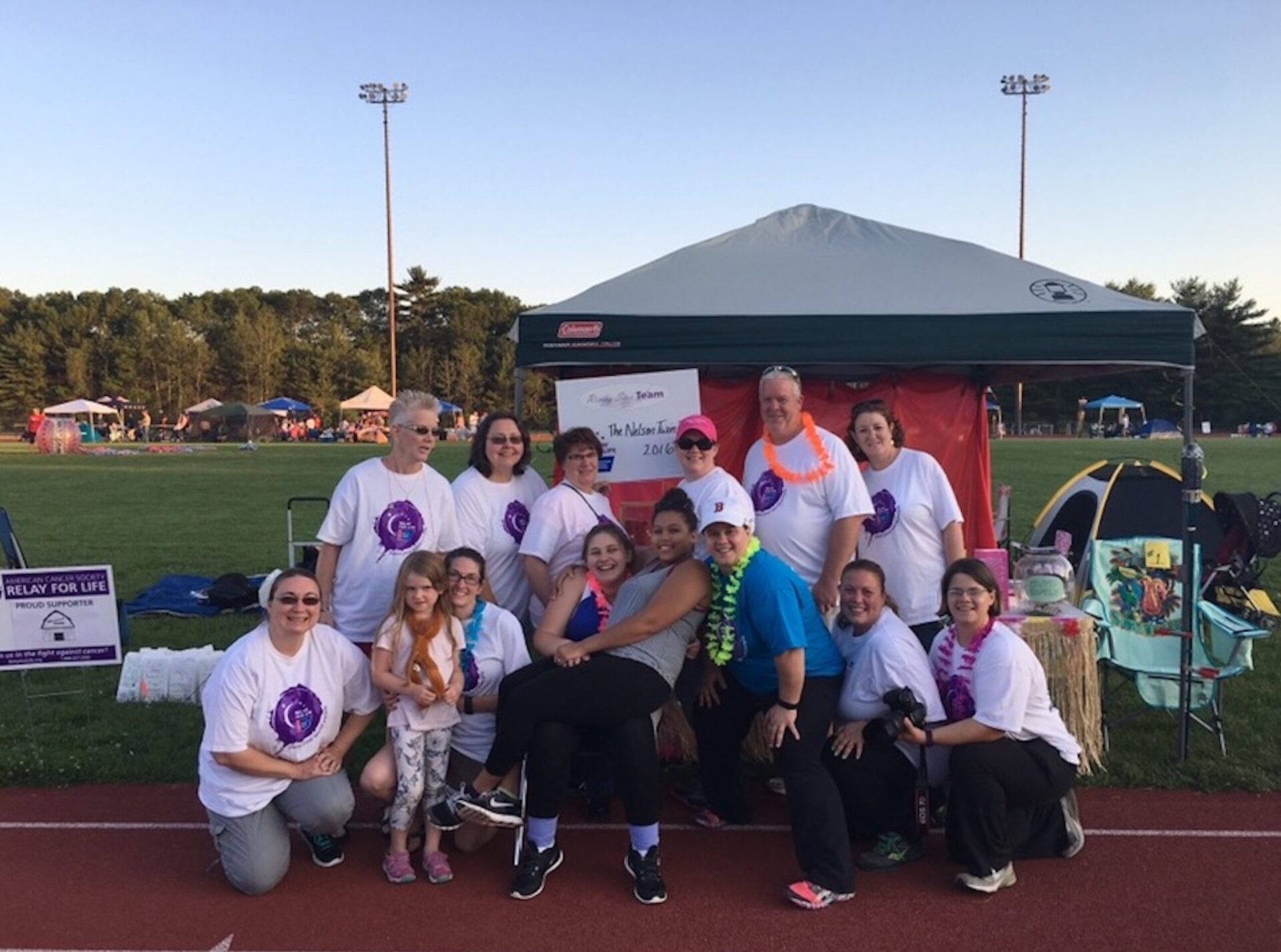 Jamie Nelson, in blue, with her team, The Nelson Team, at the 2016 Coventry Relay for Life at Coventry High School.