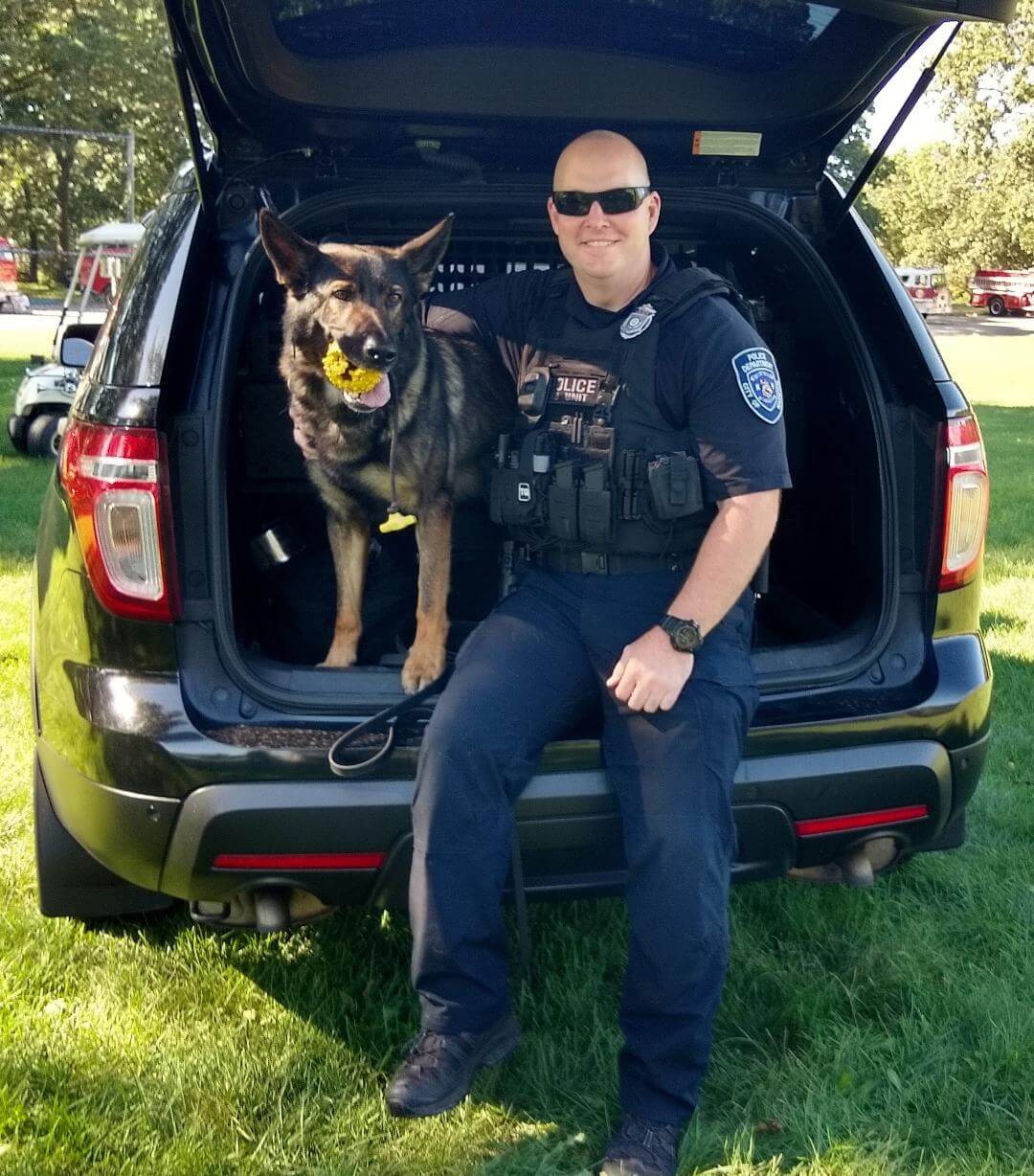 [CREDIT: Lincoln Smith] WPD K-9 Unit - Officer Aaron Steere and his dog Garry during the Antique Fire Truck Show at the Masonic Youth Center Sept. 27, 2021.
