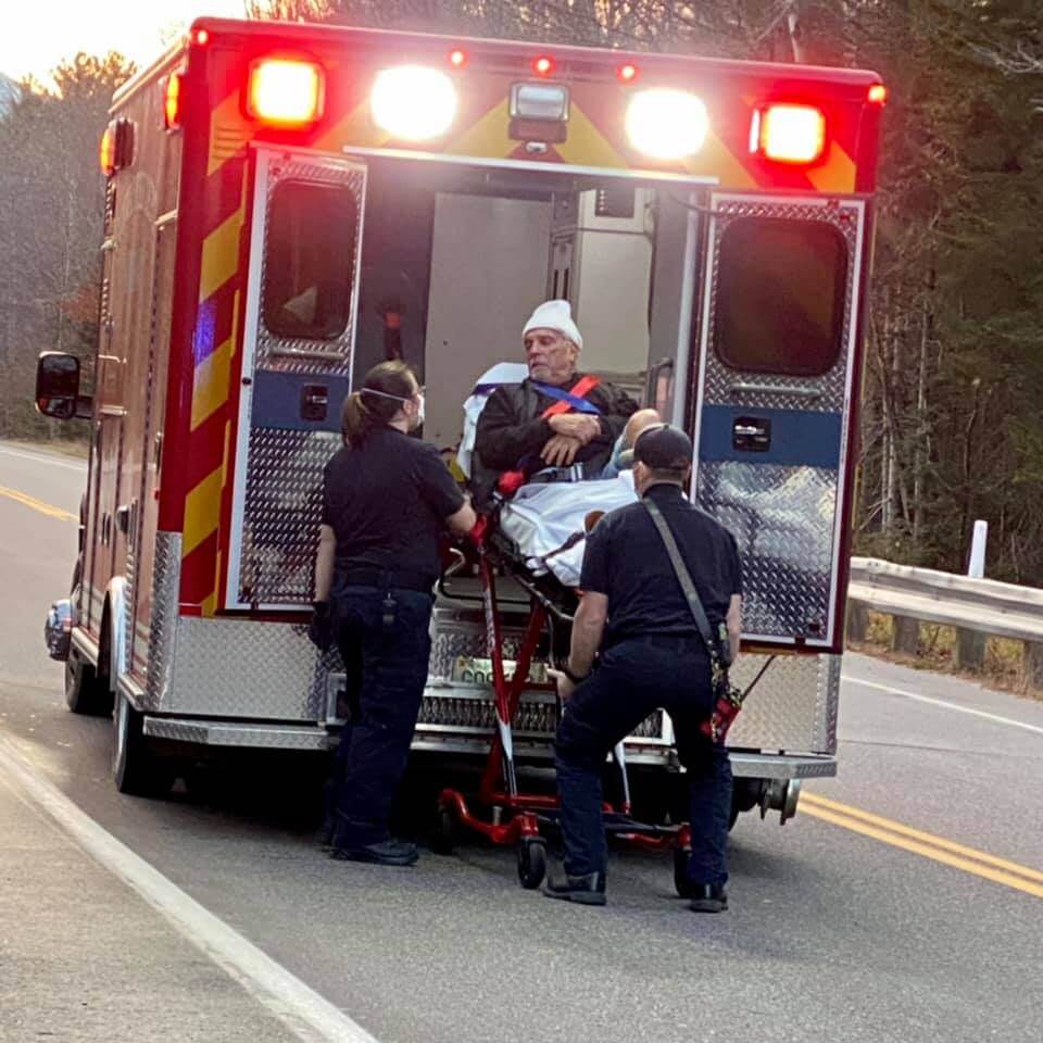 [CREDIT: Courtesy photo] A rescue crew helps Joseph Mirra, after a fall hiking in NH.