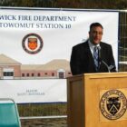 [CREDIT: Rob Borkowski] Councilman Steve Merolla speaks during the ground breaking for the new Potowomut Fire Station Oct. 29, 2014 at 225 Potowomut Road.