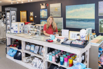 [Courtesy submission] Vanessa Piche at her North Kingstown boutique, where her fashion and painting experience are making art work, work for her.