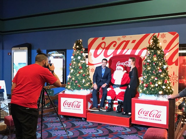 [CREDIT: Mary Carlos] The Coca-Cola Caravan visited Showcase Cinemas on Quaker Lane Thursday, offering free photos with Santa.