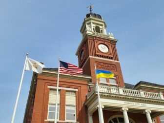 [CREDIT: Jeremy Rix] Ukraine's flag flew alongside the U.S. and RI flags at City Hall Saturday.