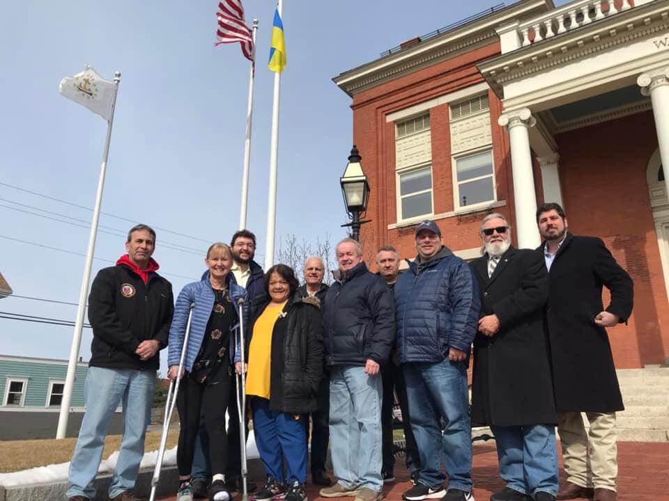 [CREDIT: Mayor Picozzi] Warwick officials raised the Ukraine flag at City Hall Saturday.