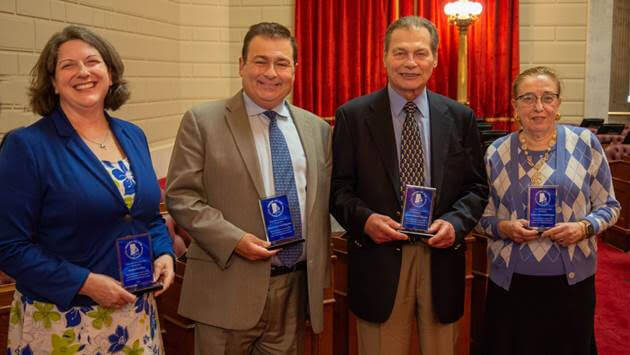 [CREDIT: LPPIB] From left, Sen. Dawn Euer, House Speaker K. Joseph Shekarchi, Senate President Dominick J. Ruggerio and Rep. Lauren H. Carson with their Clean Water Association Legislator of the Year awards.