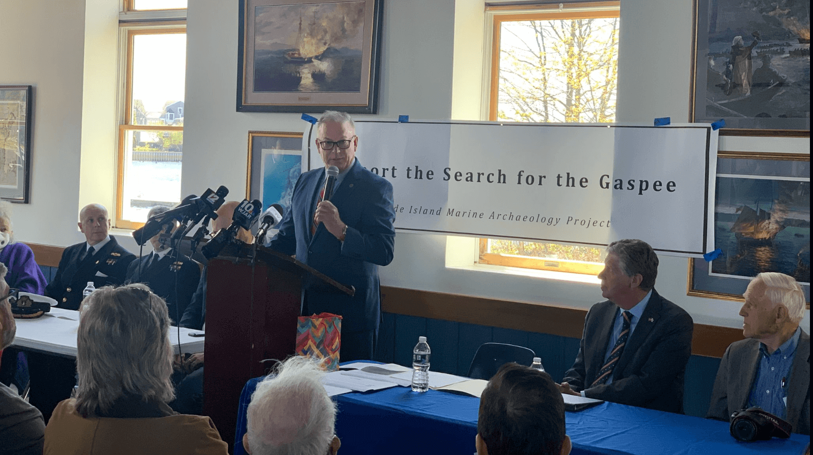 [CREDIT: Office of Rep. McNamara] State Rep. Joseph M. McNamara (D-Dist. 19) speaks during an announcement of a renewed Gaspee search at the Aspray Boat House.