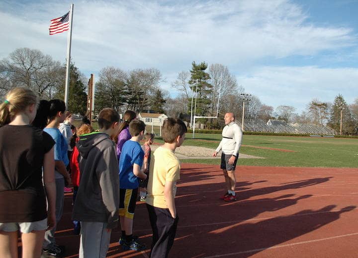 [CREDIT: Rob Borkowski] Ron Celio speaks to the members of the Warwick Wolves Thursday at Pilgrim High School.