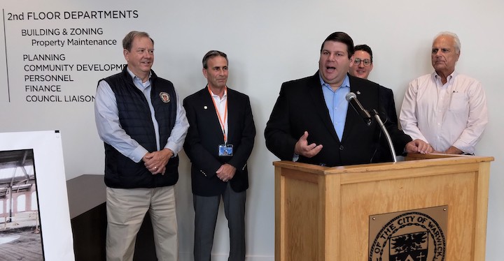 [CREDIT: Joe Siegel] Warwick City Council President Steven McAllister speaks during the opening of new city offices at the AAA building, formerly known as the Sawtooth Building, on Centerville Road.