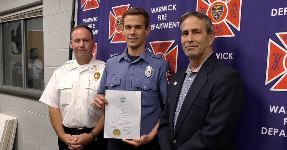 [CREDIT: Mayor Picozzi's Office] From left, Mayor Frank Picozzi, WFD Capt. Andrew Sisson, and WFD Chief Peter McMichael at WFD Headquarters, where Picozzi honored Sisson for an Oct. 15 off-duty rescue in Tiverton.