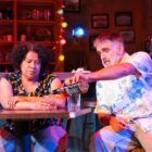 [CREDIT: The Gamm] Lynn Nottage’s Pulitzer Prize- winning “Sweat” runs at The Gamm Nov. 3 - 27. Above, Stan, played by Steve Kidd, pours a drink for Cynthia, played by Kim Gomez.