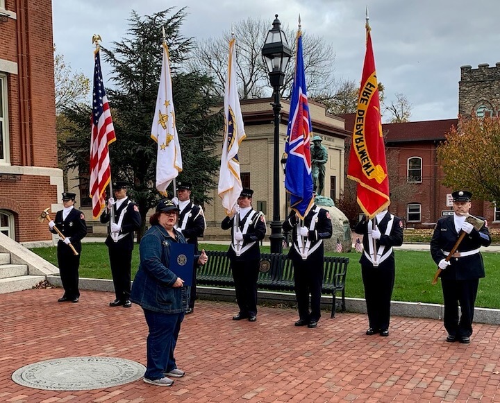 [CREDIT: Kim Wineman] Mayor Frank Picozzi and Rep. Camille Vella-Wilkinson (D-Dist. 21) led Warwick officials in a Veterans Day observance at City Hall Friday, Nov. 11, 2022. Above, Vella-Wilkinson stands before the WFD Honor Guard during the observance.
