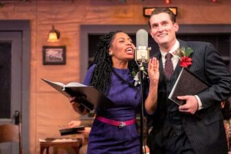 [CREDIT: Gamm Theatre] Lynsey Ford and Jeff Church, playing Rose and George Bailey in"It's a Wonderful Life, A Live Radio Play," at Gamm Theatre on Jefferson Boulevard.