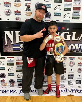 [CREDIT: Henry Emery] Rocco Emery, with trainer Bry Lemme, after his New England Silver Gloves win Dec. 11 in Lynn, MA.
