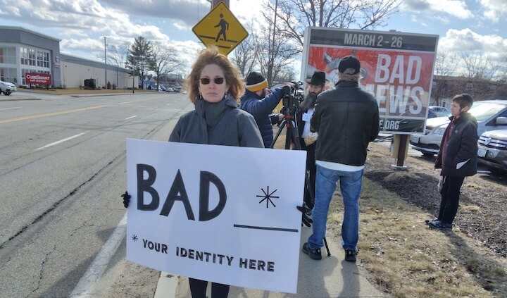 [CREDIT: Joe Siegel] Protesters objected to the billboard promoting Gamm Theatre's production of "Bad Jews," which opened for a press preview Sunday. Protesters also take issue with the title of the play.