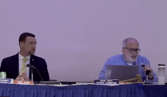 [CREDIT WPS Livestream] Warwick School Committee Member Shaun Galligan, left, led a successful vote to delay the Warwick Schools Budget hearing until information required in School Committee policy is available. School Committee Chair David Testa is at right.
