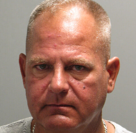 [CREDIT: Warwick Police] Terry DiPetrillo, 51 will be arraigned Sept. 7 for slapping a coworker as a punchline in what the victim described as an anti-semitic slap.