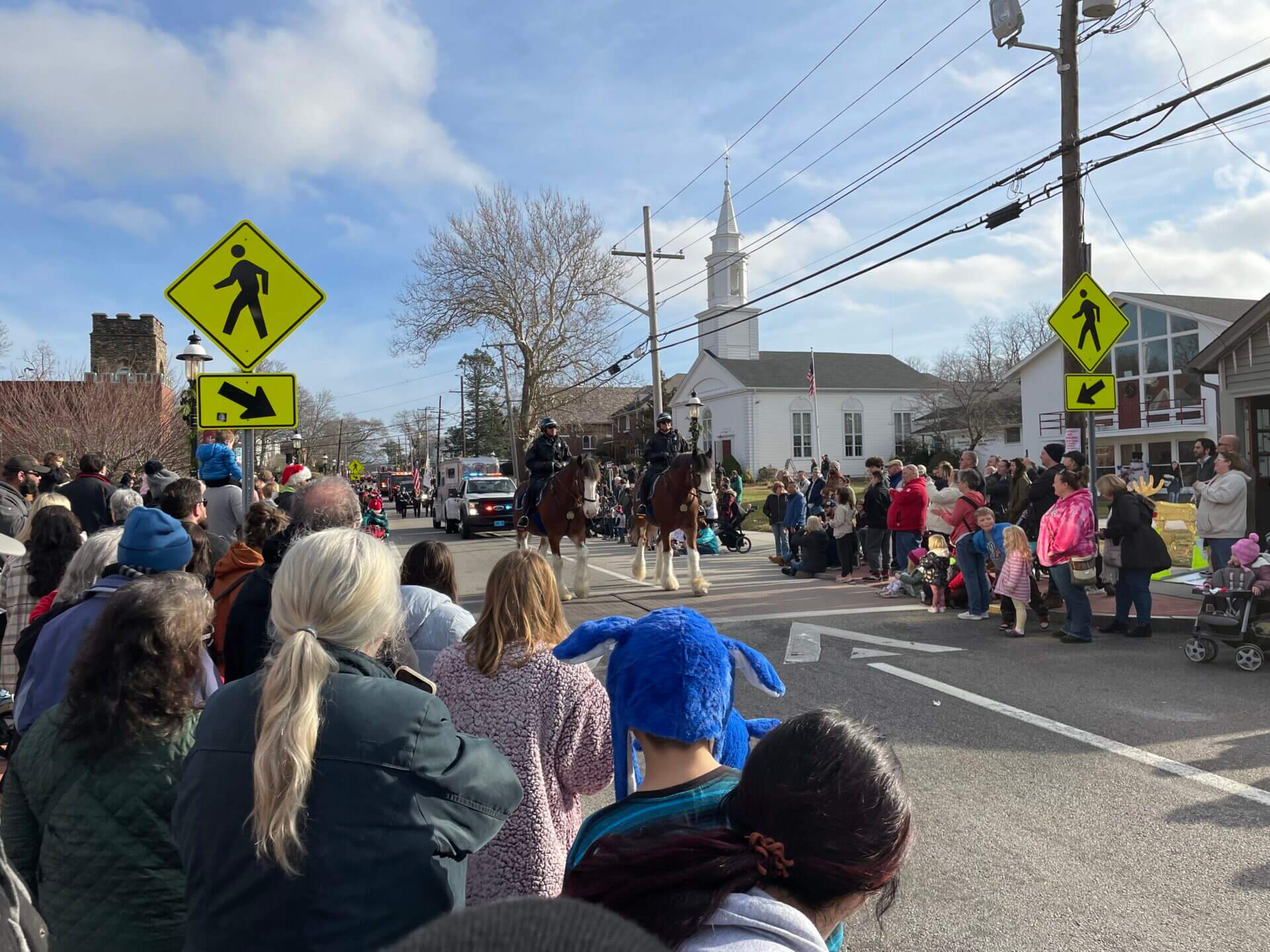 [CREDIT: Rob Borkowski]The Rolling, Strolling Apponaug Winter Festival parade winds down at City Hall. 