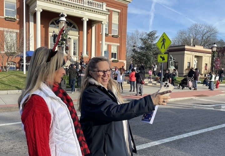 [CREDIT: Rob Borkowski] From left, Beverly Hall, administrator at the Warwick Sewer Authority and Central RI Chamber Director Lauren Slocum at the Apponaug Winter Festival Dec. 9.