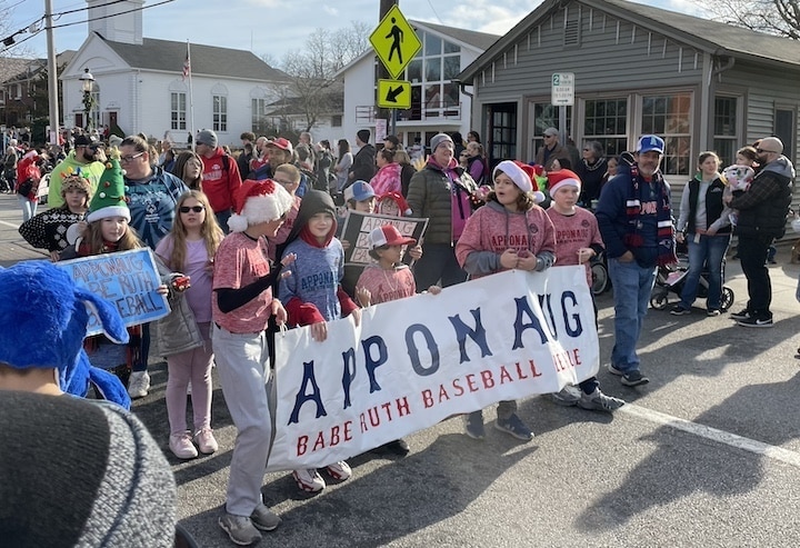 [CREDIT: Rob Borkowski] At the start of the Apponaug Winter Festival parade Dec. 9, members of the Apponaug Babe Ruth League.