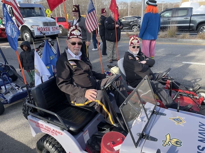 [CREDIT: Rob Borkowski] At the start of the Apponaug Winter Festival parade Dec. 9, John Adams and Lt. James Papson wait for their turn on Veterans Memorial Highway.