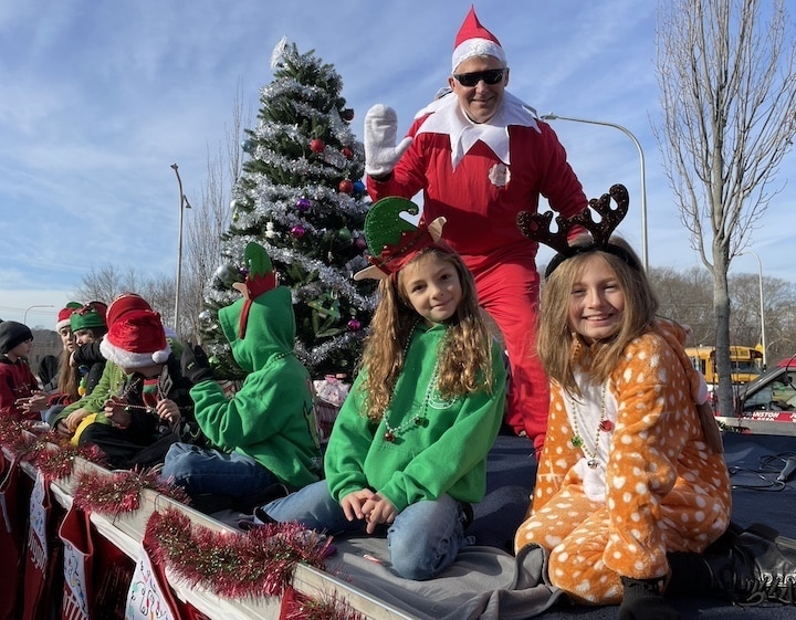 [CREDIT: Rob Borkowski] Hoxsie Elementary Principal Gary McCombs, Lilian Marchetti, and Juliana Graceau at the start of the Apponaug Winter Festival parade Dec. 9.