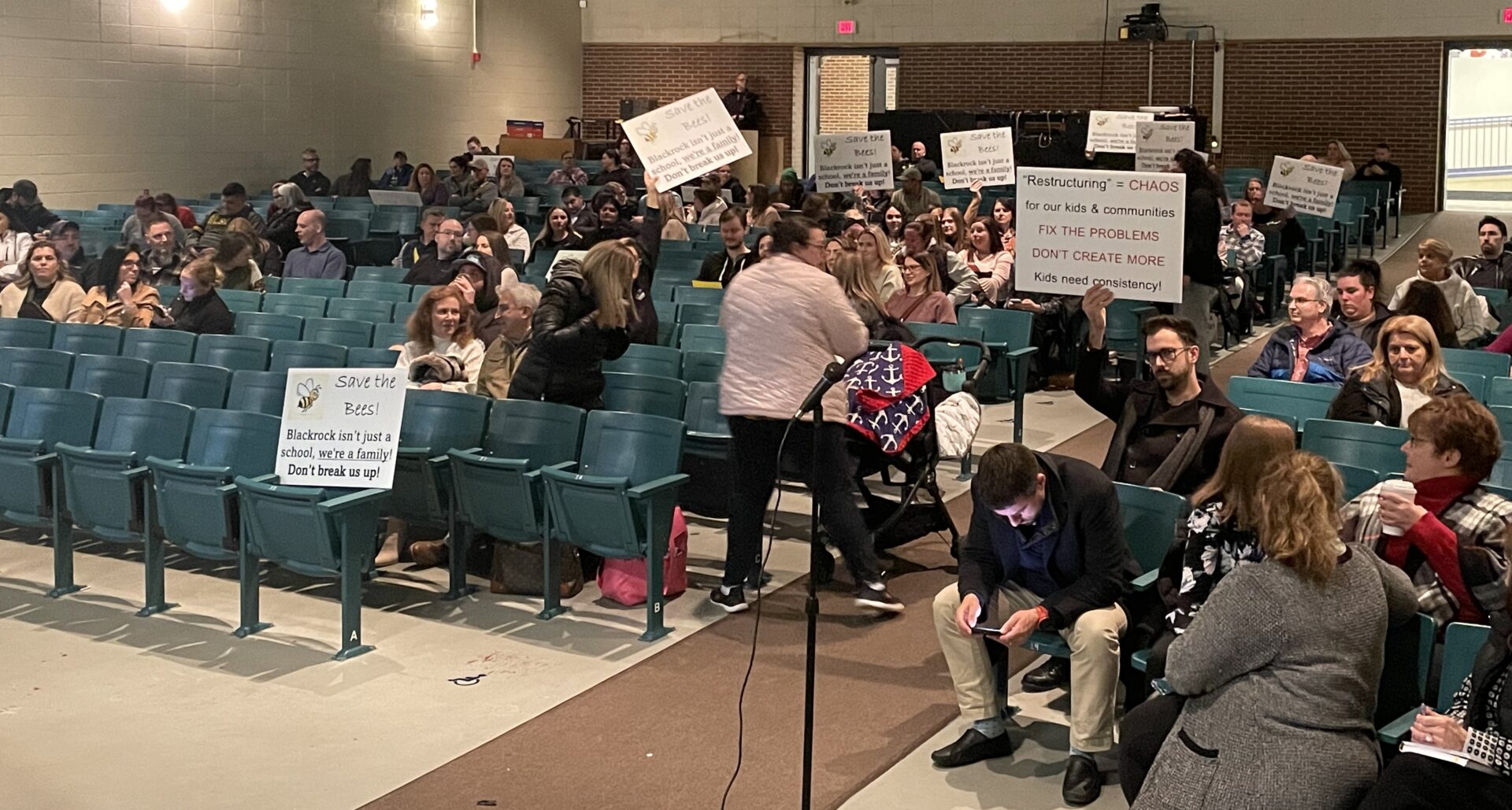[CREDIT: Rob Borkowski] Parents, students and teachers crowded Allan Shawn Feinstein Middle School's auditorium Jan. 11 to oppose a Coventry schools restructure plan that would convert Black Rock Elementary School to an early learning center, reorganizing the remaining elementary schools. 