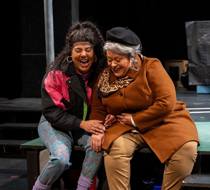 [CREDIT: Marisa Lenardson] In Trinity's 'La Broa’ (Broad Street), Lucrecia and Doña Rosa, played by Marina Tejada and Alina Alcántara, respectively, share a laugh.