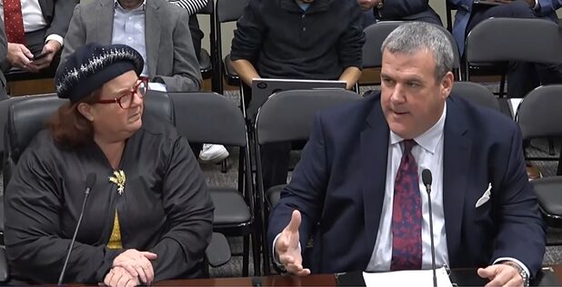 [CREDIT: Legislative Press & Information Bureau] At left, Rep. Camille F.J. Vella-Wilkinson's new bill would require state websites to be accessible to people with disabilities. Secretary of State Greg Amore, right speaks in support.