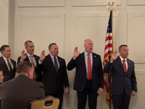 [CREDIT: Mayor Picozzi's Office] Rhode Island State Supreme Court Justice Francis X. Flaherty swore in the new board for the RI Police Chiefs Association Jan. 12. At far right is WPD Police Chief Col. Brad Connor. With him are: Chief Thomas F. Oates, III, Woonsocket Police Department – Vice President; Colonel Michael Correia, Barrington Police Department – Sergeant-at-Arms; Colonel Michael J. Winquist, Cranston Police Department – Secretary; Chief Matthew C. Moynihan, South Kingstown Police Department – Treasurer