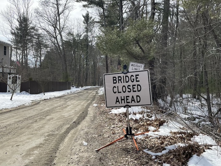 [CREDIT: Rob Borkowski] A sign warns drivers of the closed bridge at the intersection of Sisson Road and Cahoone Road.
