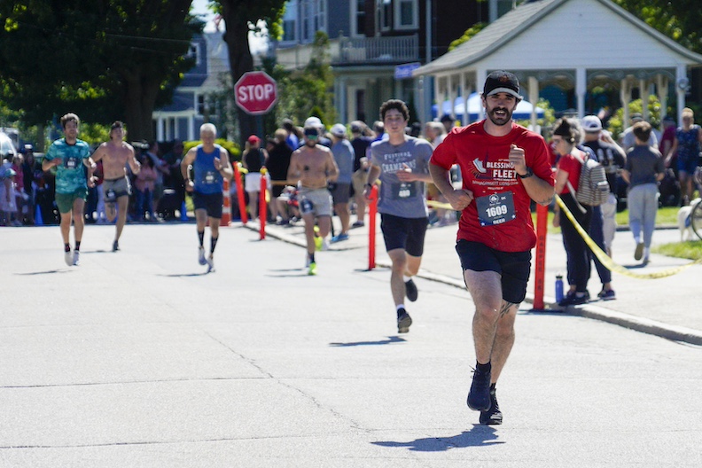 [CREDIT: Laura Paton] Tyler Shammas of Warwick nears the finish line in Saturday’s Gaspee Days 5K race, with a time of 20:32.