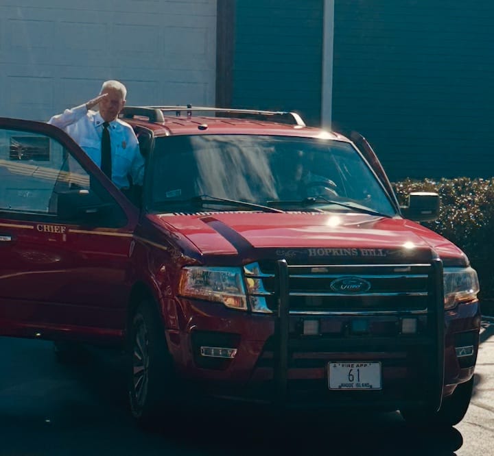 [CREDIT: Denise Brown] Hopkins Hill Fire Chief Frank Brown delivers a farewell salute during his last day before retiring as Hopkins Hill Fire Chief. 