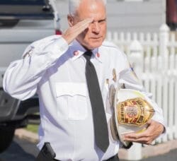 [CREDIT: Denise Brown] Hopkins Hill Fire Chief Frank Brown delivers a farewell salute during his last day before retiring as Hopkins Hill Fire Chief.