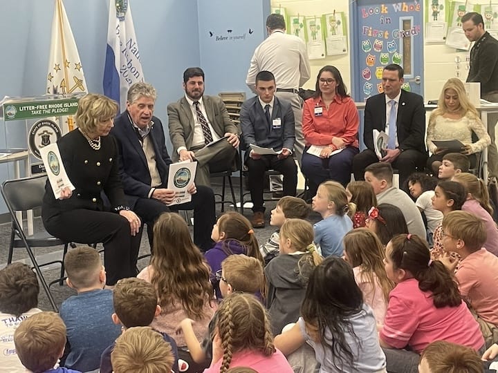 At Park Elementary Friday, from left, First Lady Susan McKee, Gov. Dan McKee, Rep. Joseph J. Solomon Jr. (D-Dist. 22, Warwick), Members of the Governor's Young Leaders Advisory Group and co-authors of the Litter-Free Rhode Island coloring book Jordan Brazeau and Margaret Price, and Warwick School Committee member Shaun Galligan.