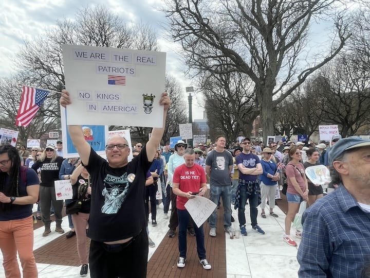 [CREDIT: Rob Borkowski] Bob Giammarco of North Attleboro, MA, among thousands of people gathered at the State House April 19 Hands Off protest against the Trump Administration.