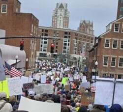 [CREDIT: Jeni Luther] Thousands of people swelled the streets in Providence April 5 to tell the Musk -Trump Coup to take their hands off Americans' freedoms, security, voting rights, Medicare, Social Security and powers not granted in the U.S. Constitution during the national Hands Off protest.