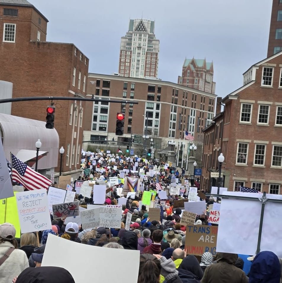 [CREDIT: Jeni Luther] Thousands of people swelled the streets in Providence April 5 to tell the Musk -Trump Coup to take their hands off Americans' freedoms, security, voting rights, Medicare, Social Security and powers not granted in the U.S. Constitution during the national Hands Off protest.