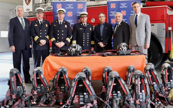 [CREDIT: Sen. Reed] U.S. Sens Jack Reed & Sheldon Whitehouse and U.S. Rep Seth Magaziner joined Mayor Frank Picozzi, Fire Chief Peter McMichael, and Warwick firefighters to launch 72 new self-contained breathing apparatus (SCBA) units.
